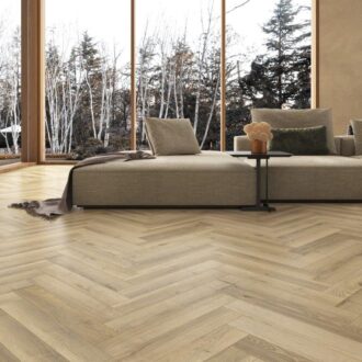 spring herringbone laminate flooring in a room view with couch