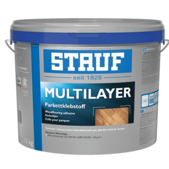 A 13kg Stauf Multi Layer tub of wood flooring adhesive with the blue and grey product label clearly visible.